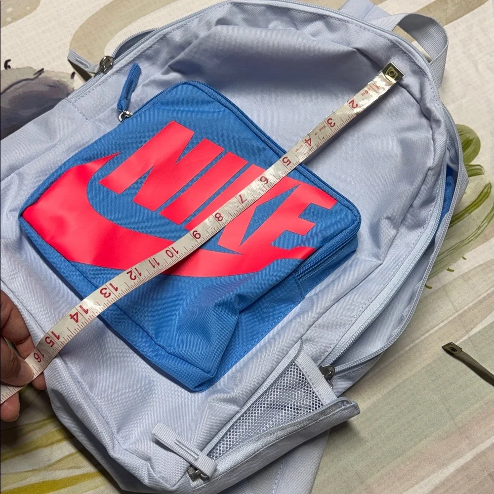 Nike Classic Kids' Backpack in Football Grey with a University Blue Bright logo